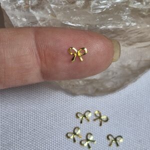 Aplique mini laço dourado